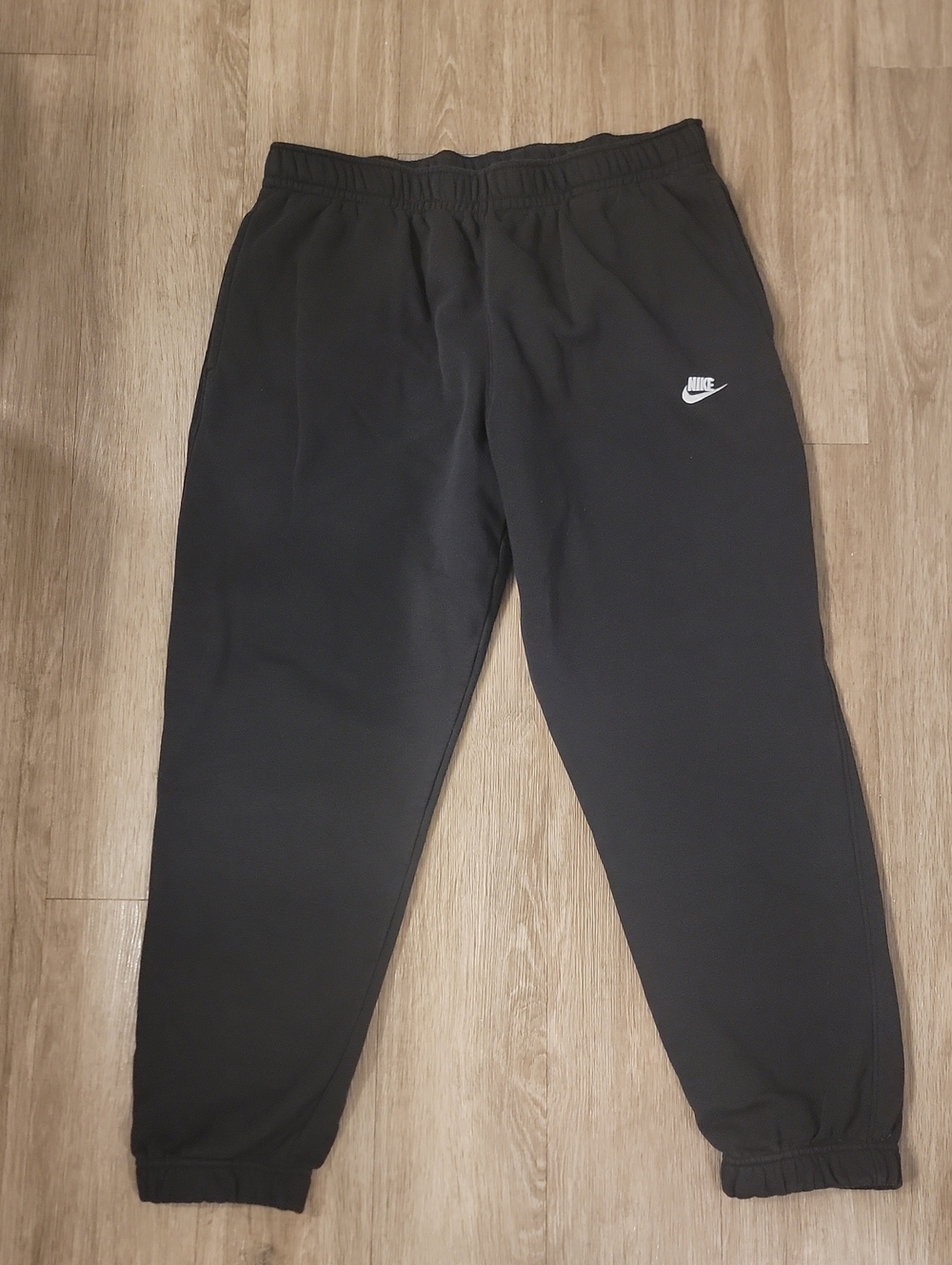 Nike Black Sweatpants with White Swoosh Logo